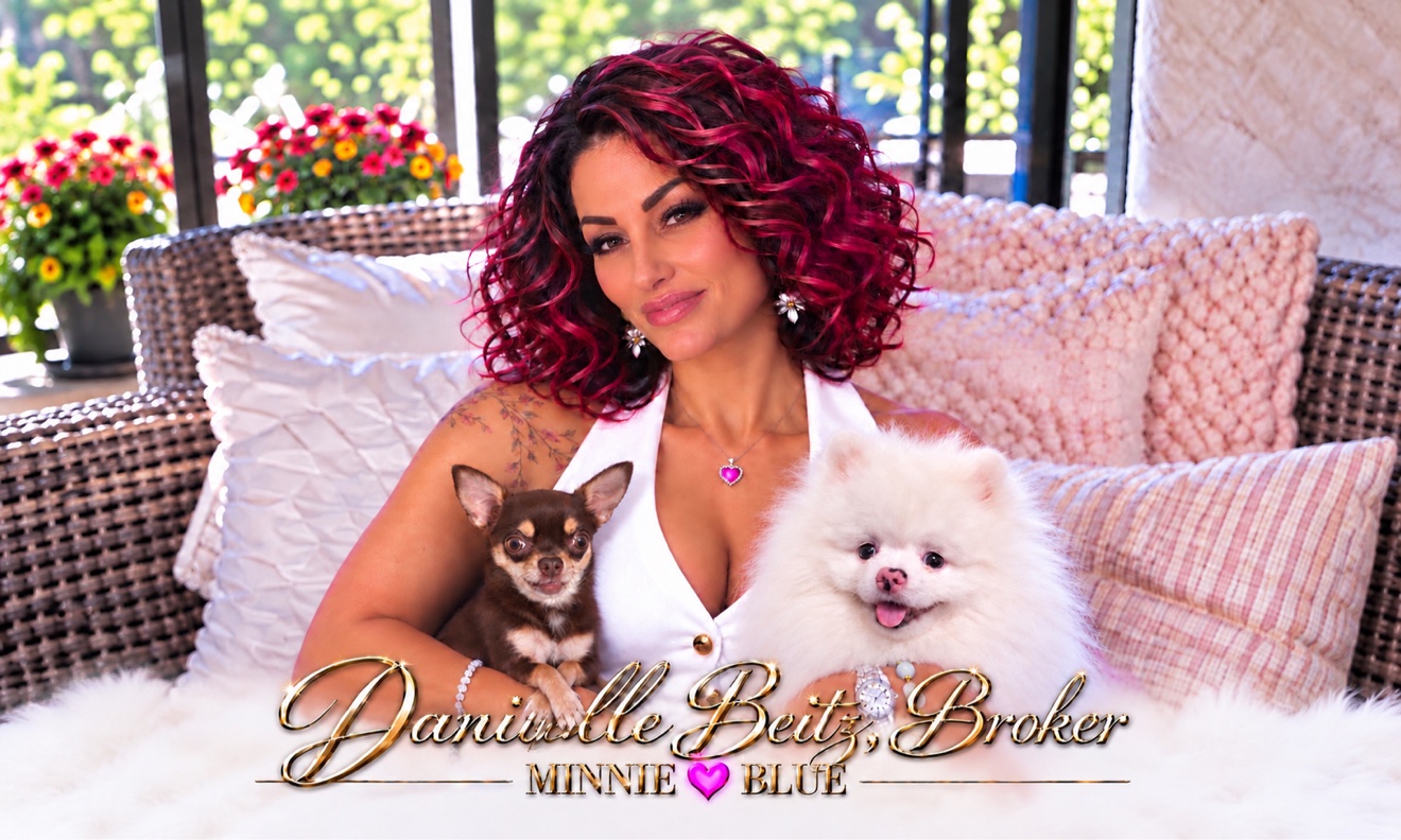 Danielle Beitz, Broker — RE/MAX Parry Sound-Muskoka Realty, with her dogs Minnie and Blue